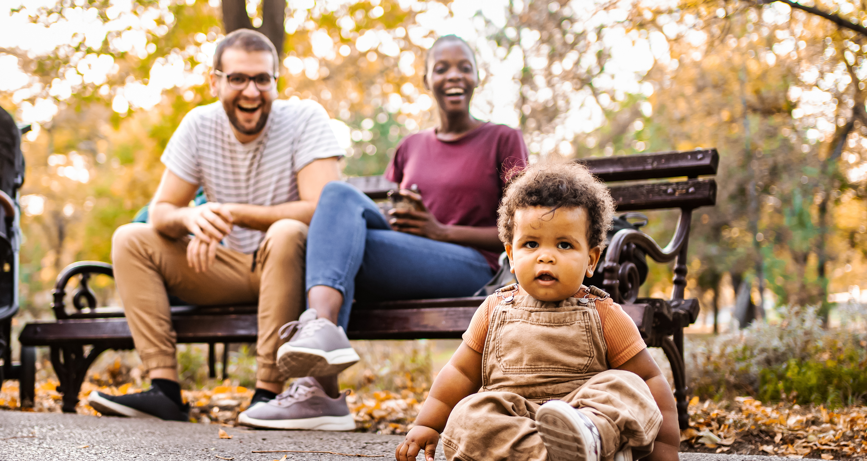Parents in the park with their baby boy