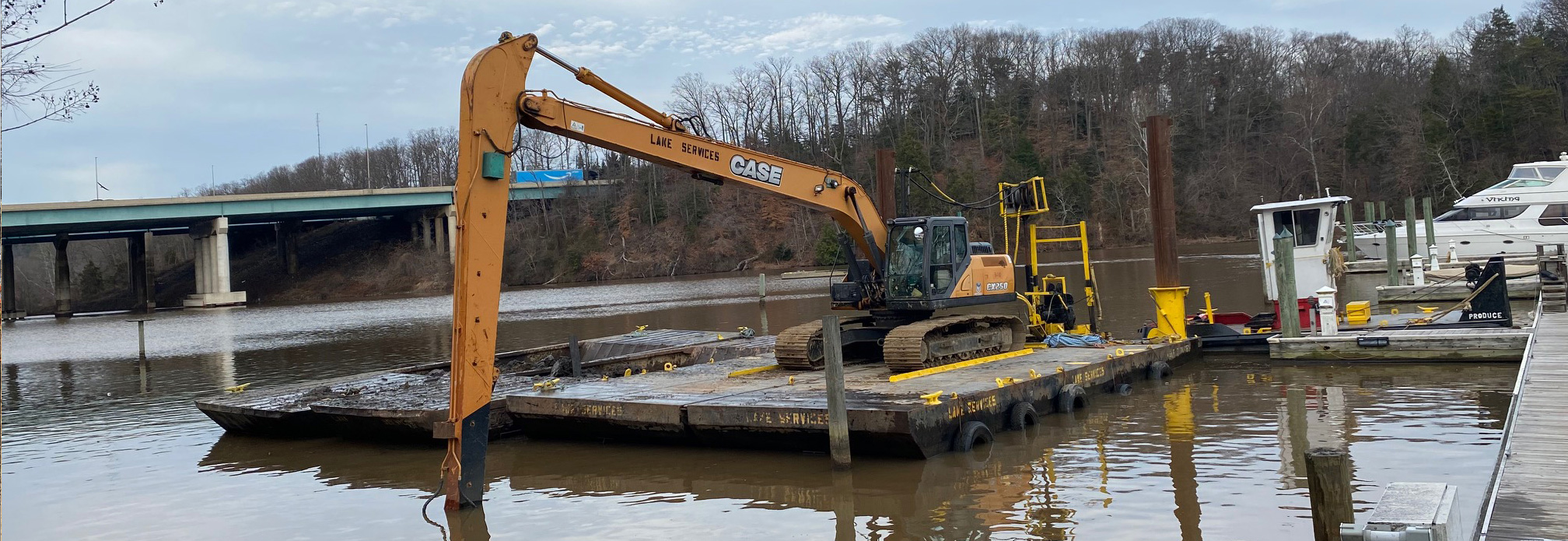 Lake Services long-reach excavator on a barge